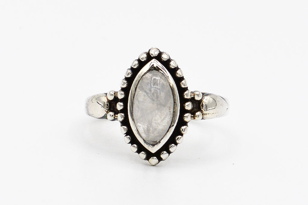 Picture of the Luma ring, a Nelumbo jewelry piece, handmade from 925 sterling silver and moonstone