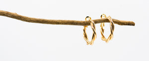 Picture of the Neesha earrings, a Nelumbo jewelry piece, handmade from 14K gold