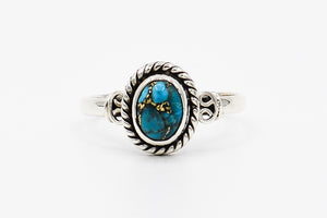Picture of the Delia ring, a Nelumbo jewelry piece, handmade from 925 sterling silver and turquoise stone
