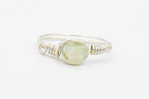 Picture of the Farha ring, a Nelumbo jewelry piece, handmade from 925 sterling silver and olive jade