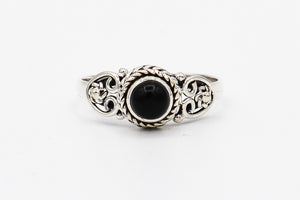 Picture of the Heena ring, a Nelumbo jewelry piece, handmade from 925 sterling silver and onyx stone