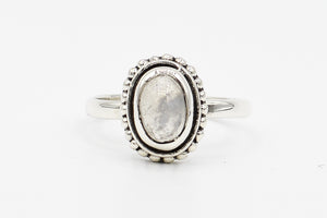 Picture of the Laila ring, a Nelumbo jewelry piece, handmade from 925 sterling silver and moonstone