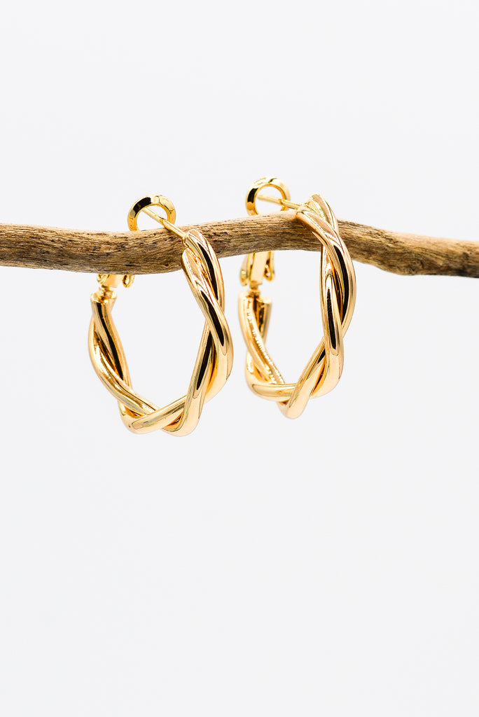 Picture of the Neesha earrings, a Nelumbo jewelry piece, handmade from 14K gold