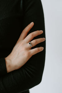 Picture of the Heena ring, a Nelumbo jewelry piece, handmade from 925 sterling silver and onyx stone