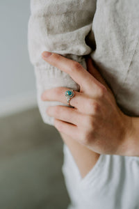 Picture of the Delia ring, a Nelumbo jewelry piece, handmade from 925 sterling silver and turquoise stone