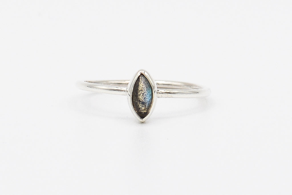 Picture of the Pyaar ring, a Nelumbo jewelry piece, handmade from 925 sterling silver and labradorite stone