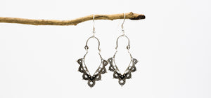 Picture of the Sundar earrings, a Nelumbo jewelry piece, handmade from 925 sterling silver