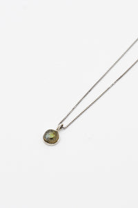 Picture of the Sarika necklace, a Nelumbo jewelry piece, handmade from 925 sterling silver and labradorite stone