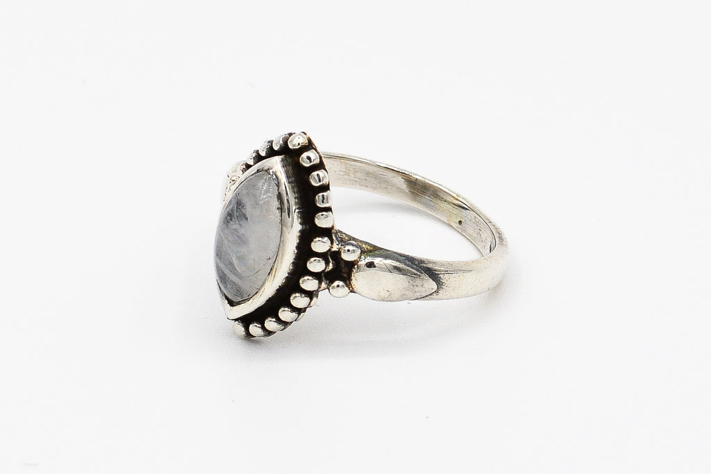 Picture of the Luma ring, a Nelumbo jewelry piece, handmade from 925 sterling silver and moonstone