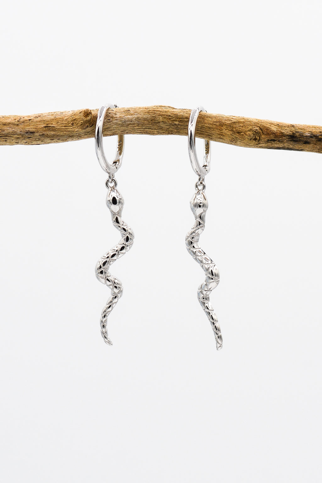 Picture of the Tahil earrings, a Nelumbo jewelry piece, handmade from 925 sterling silver